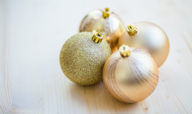 blur, christmas, christmas ornament, close-up, design, gold, pattern, round, satin finish, shape, shiny, traditional, wooden surface, christmas, christmas, christmas, christmas, christmas, christmas ornament, gold