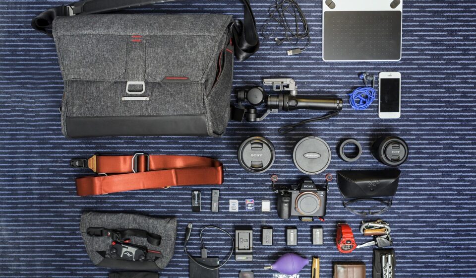 bag, belt, box, cable charger, camera, cellphone, equipment, keys, lens, power bank, strap, technology, tools, watch, blue technology, blue camera, blue bank, blue tools, blue watch, blue key, blue power, blue box, power bank, power bank, power bank, power bank, power bank
